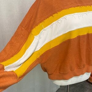 Terry Cloth Sweater with batwing sleeves.